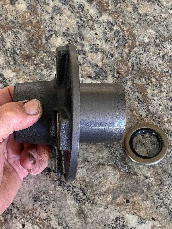 Replacement machined and painted hub and seal.
