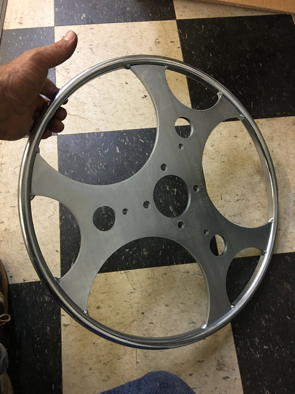 19" roll out wheel ring welded and zink plated.